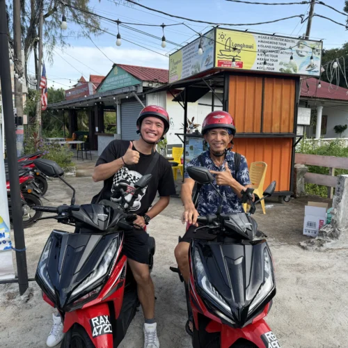 Father and son renting scooter with us.