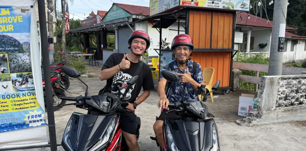 Father and son renting scooter with us.