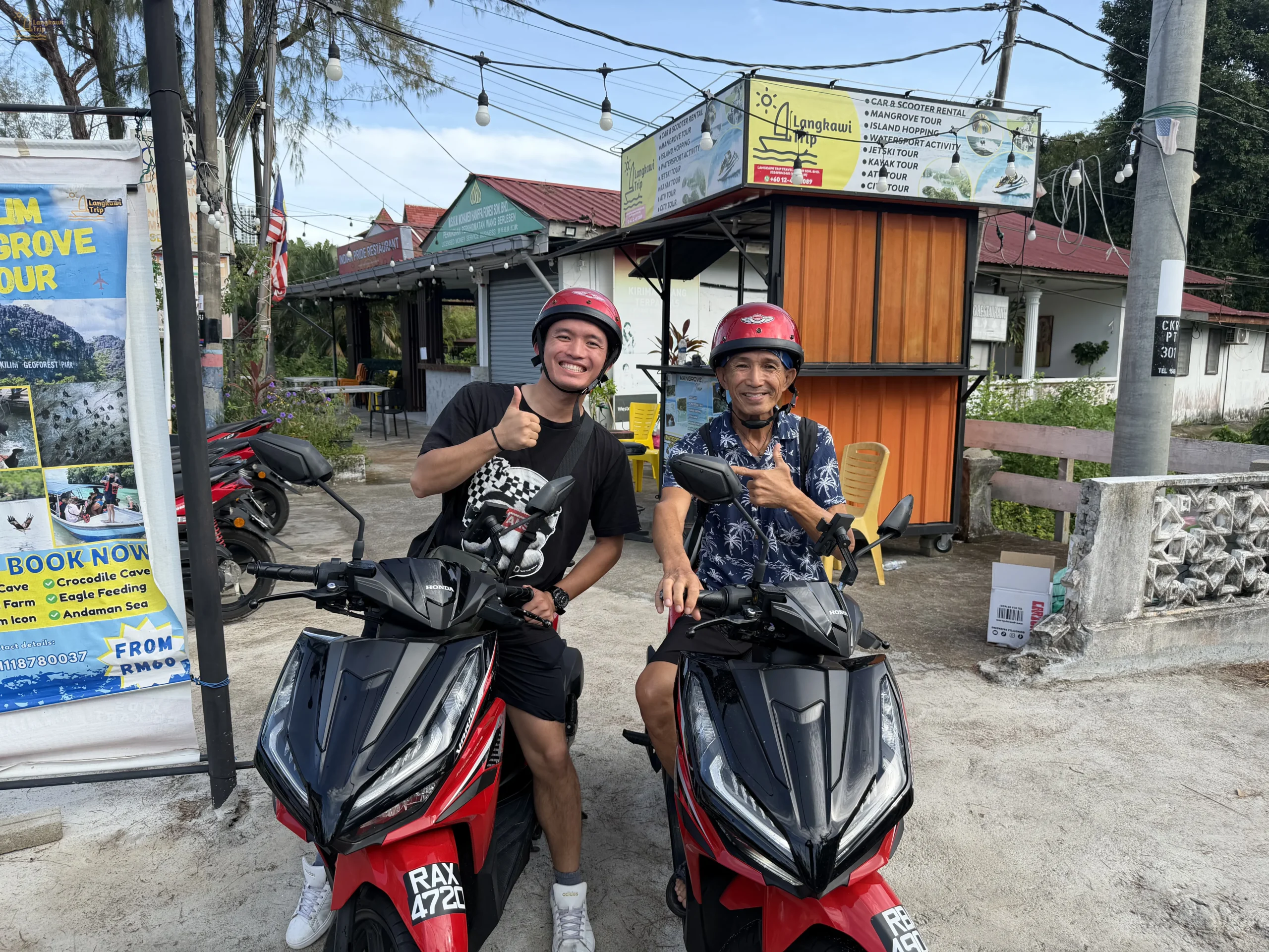 Father and son renting scooter with us.